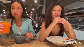Two shameless chicks have lunch without panties at the mall in public
