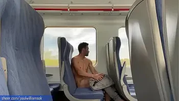 Sexy tanned man travelling naked by train. Very risky public nudity