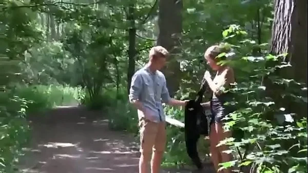 Young guy fucks an adult lady with beautiful boobs right in the forest
