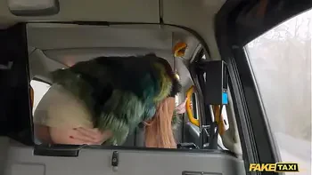 Fake Taxi Redhead MILF in sexy nylons rides a big fat dick in a taxi