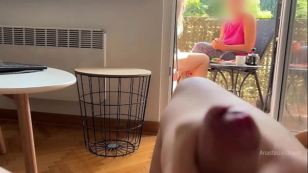 My husband is jerking off and cum in front of my stepmom a while we talk on balcony.