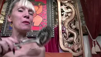 Amazing 60 year old cougar strips and gets fucked