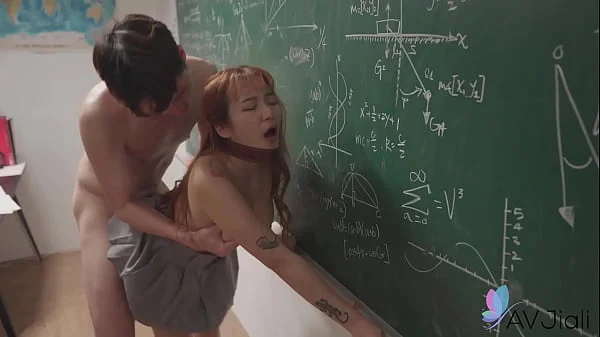 Chinese teen slut Jinbaona fucks with the teacher in the classroom.