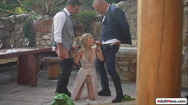 Petite bride is dped by hubby and waiter