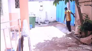 The photographer and his model caught in a photo session fucking copiously with his big and long cock in public on African porn movies