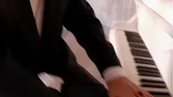 Clothed man and naked women