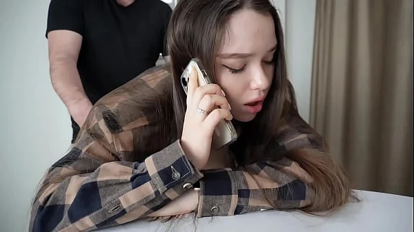 Fucking my stepsister while she's on the phone.