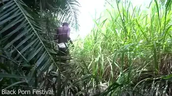 Skinny African tribe woman working outdoor