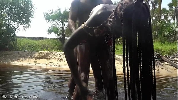 Skinny zulu hottie with perfect tits getting fucked while bathing in the river