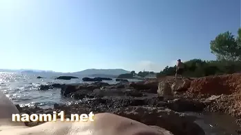 feet playing on a public beach