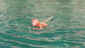 Blue water and a naked girl!