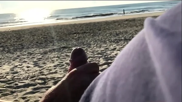 The milf suddenly came up from behind and started jerking me off in front of everyone