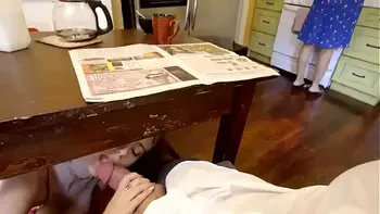 step Daughter sneaks under the table to suck daddy's cock