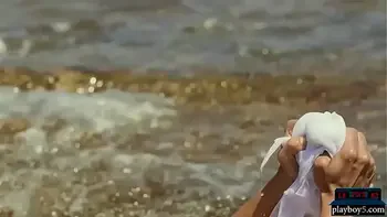 Sexy bikini teen strips naked outdoor near the sea