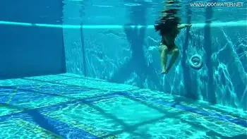 Hot Spanish and Russian teen in the pool naked