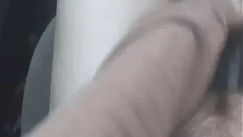 Squirting On A CuCUMber In A Parking Lot