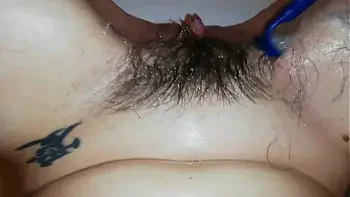 shaving off my extreme hairy big clit cunt in close up