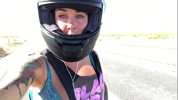 felicity feline riding on aprilia tuono motorcycle