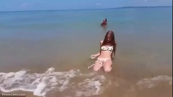 Two Girls have a Fun Time at the Beach
