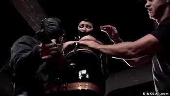 Gimp slave in latex fucked in threesome