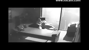 Security camera Films Sex At Office On Desk