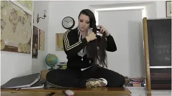 Ivy Plays With Her Long Shiny Hair While Stripping