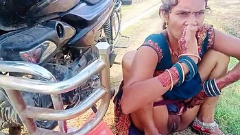 Desi Bhabhi RadhaDevi Pissing in Field Outdoor Hindi Webcam Masturbation