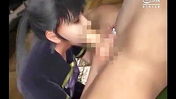 Holding the dick between her tits, she violently thrusts in and out and cums on her face.