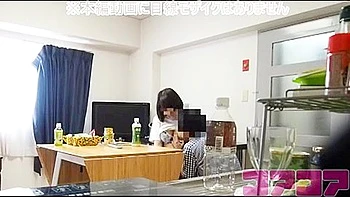 She spreads her legs on the bed and licks her breasts.