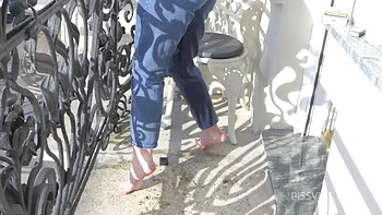 Wetting Jeans And Smoking On Balcony