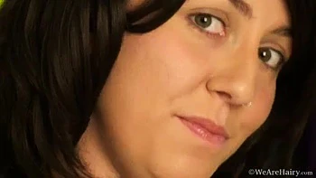 Natural Raven fingers her fluffy twat - WeAreHairy