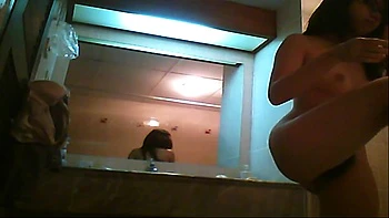 Beautiful asian naked in a shower