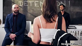 Teen student kneels while her teachers take out their cocks