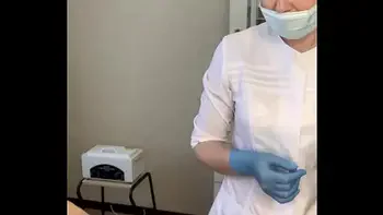 The patient CUM powerfully during the examination procedure in the doctor's hands