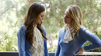 Two cute babes share a big black cock in an intense threesome