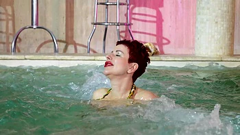 Bbw Lisa Pinelli enjoys solo sex in a flower bikini by the pool