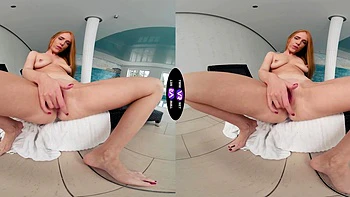 Redhead beauty Holly Molly enjoys solo sex by the pool