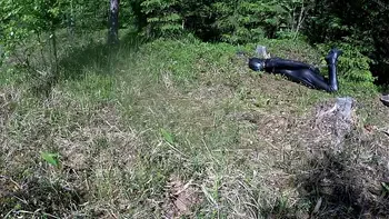 Outdoor hogtie in hot summer day.