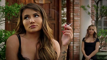 Two beautiful girls share a big black cock in an intense threesome