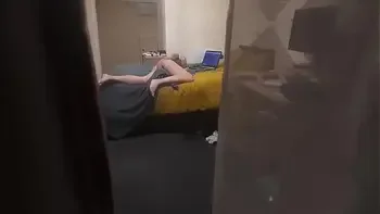Girl caught masturbating through the window