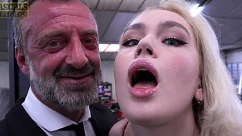 A couple has fun with sexy Greta Foss in lingerie and stockings.