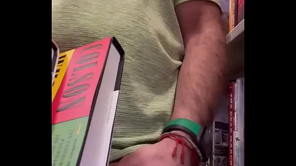 Jerking off at the bookstore. Public masturbation