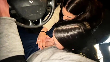 Double blowjob while driving a van