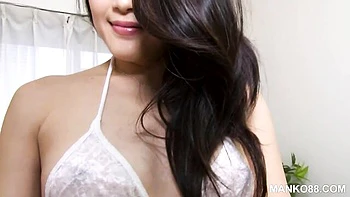 Asian angel Kyoko Nakajima nicely touches her shaved pussy with love