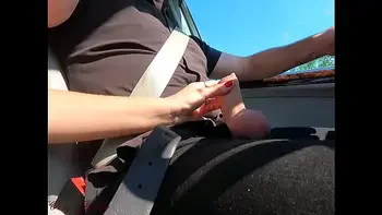 While driving my neighbor La Gourmande wanks my cock for a long time before sucking me while I drive! when I finally stop she greedily swallows all my cum without losing a drop