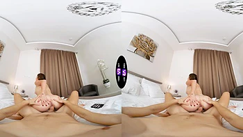 Two sexy babes ride a big dick in a steamy virtual reality scene