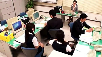 A blonde Japanese babe kisses another lesbian