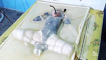 Frogtied In Transparent Vacbed